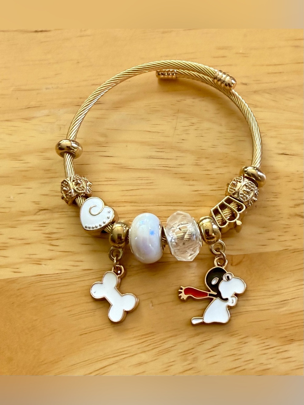 Gold-tone Charm Bracelet with White Enamel Snoopy & Bone Charms